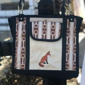 Custom black and tan plaid tote bag featuring a detailed illustration of a fox, with a leather shoulder strap.