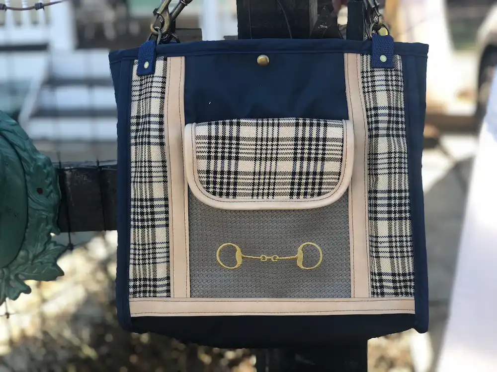 Custom plaid tote bag, with a leather shoulder strap.