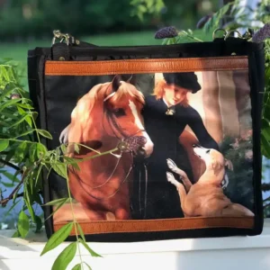 Custom tote bag featuring a detailed illustration of a horse, lady in dress and dog, with a leather shoulder strap.